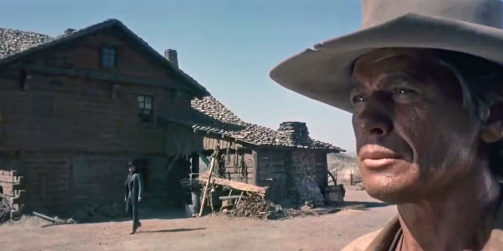 Scene from “Once Upon a Time in the West” showing iconic Spaghetti Western characters in a tense moment